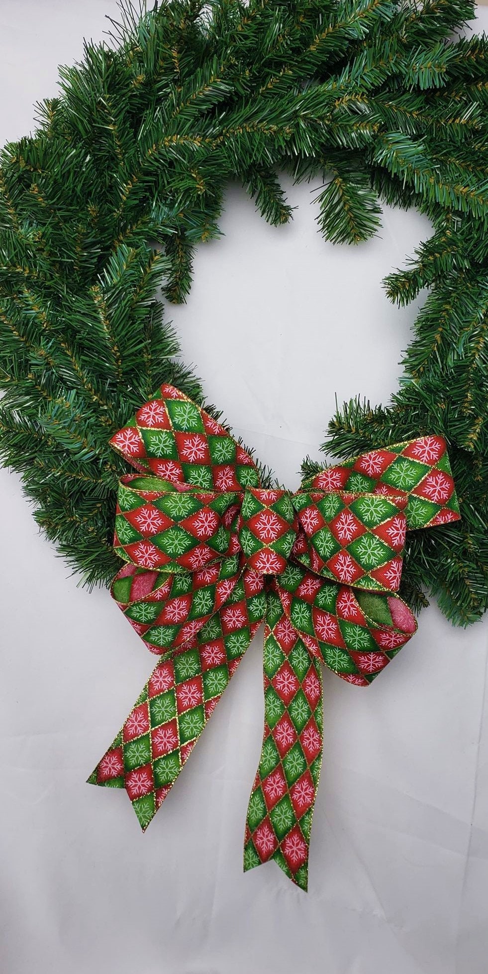 Red and Green Harlequin Snowflake Christmas Bow
