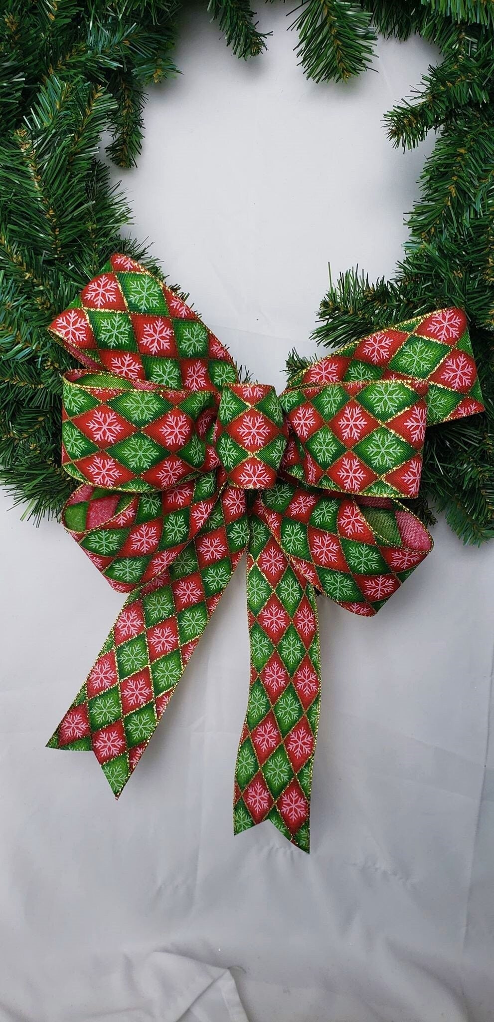 Red and Green Harlequin Snowflake Christmas Bow